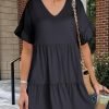 Saonta  Women's 2024 Summer Trendy V Neck Ruffle Short Sleeve A Line Tiered Flowy Casual Mini Beach Dress with Pockets